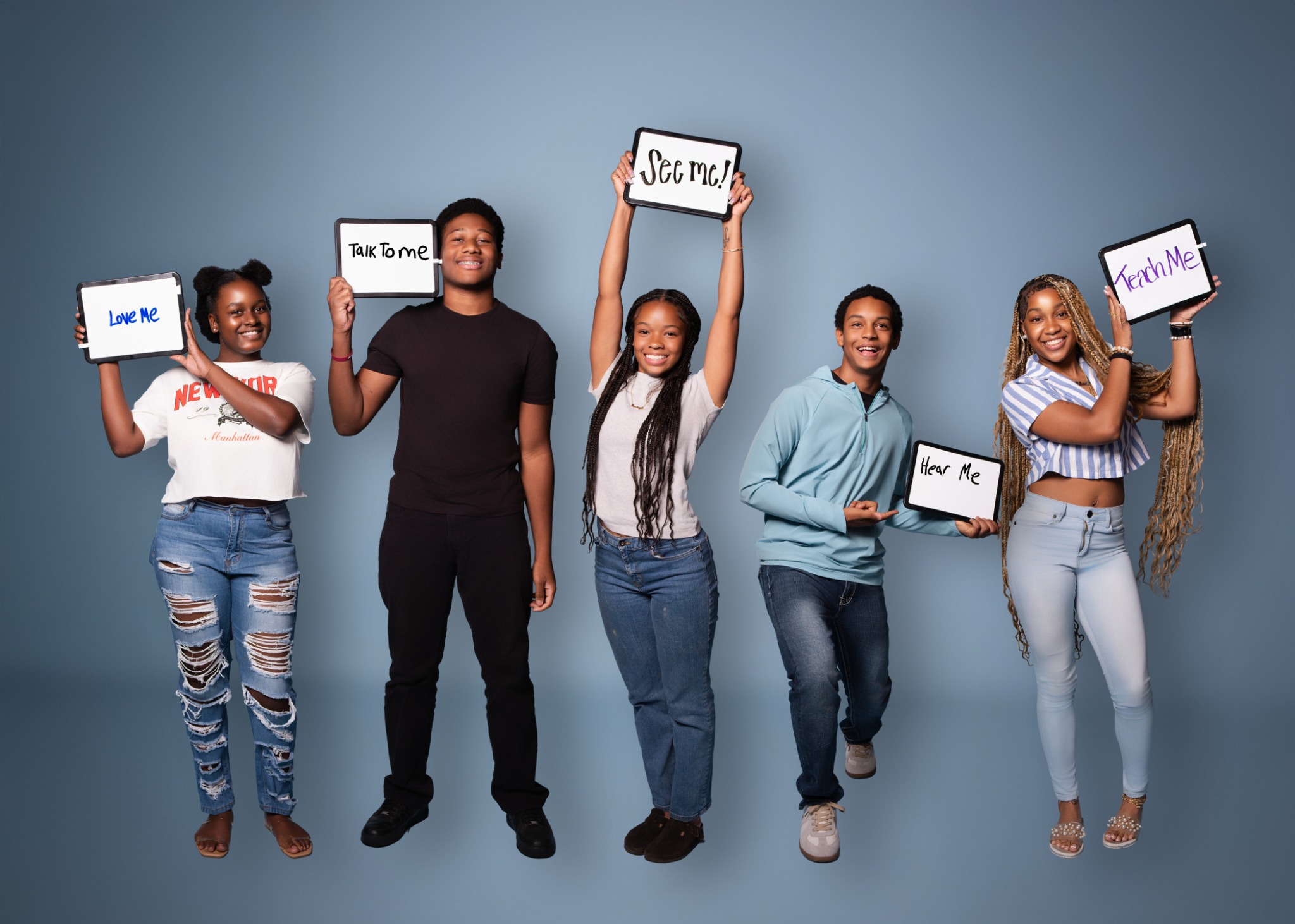 Y.E.P.! youth holding handwritten messages